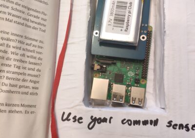 Raspberry pi and power source hidden in book